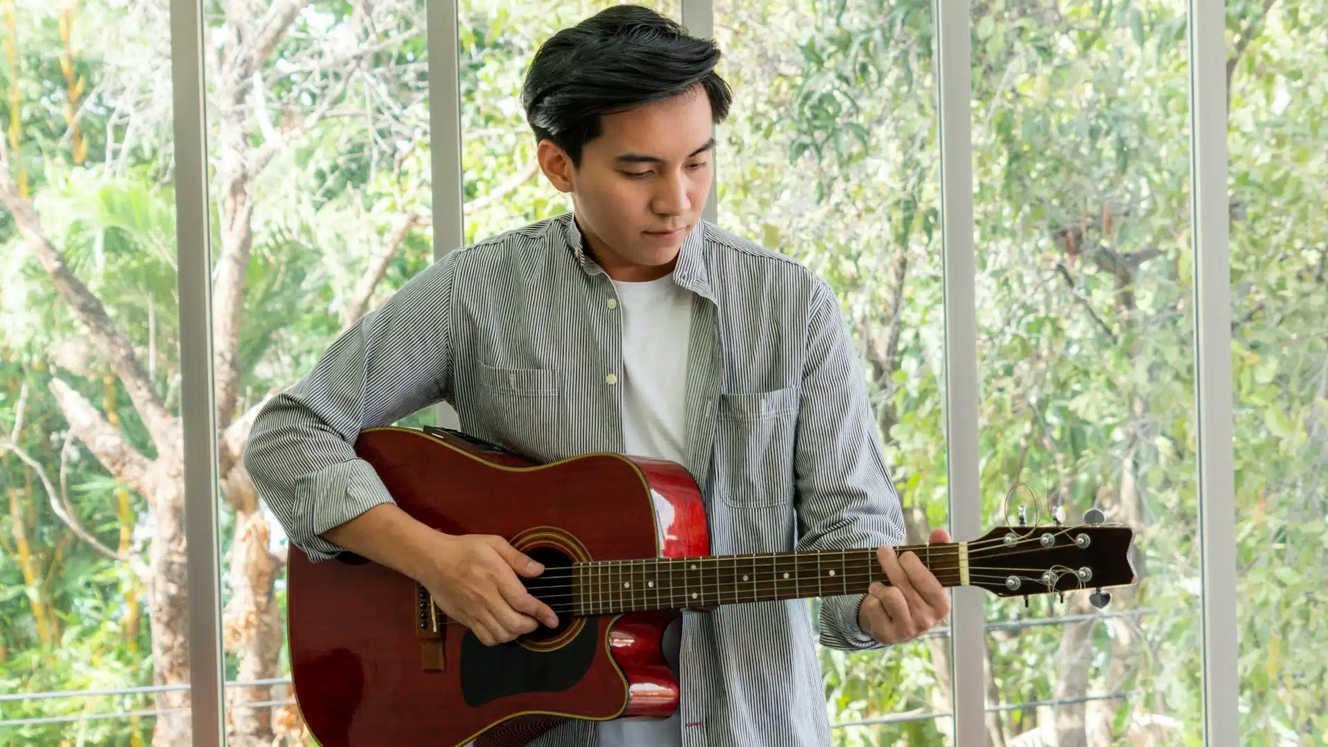 A man playing guitar