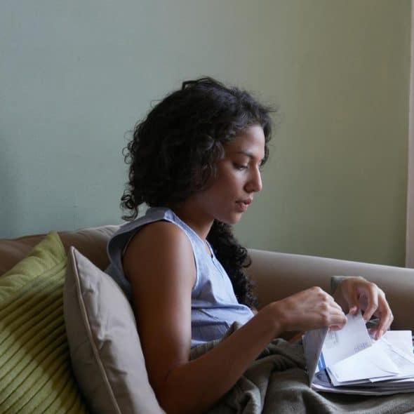 A woman sitting on a couch