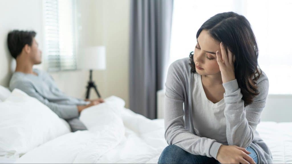 A man and woman not talking to each other
