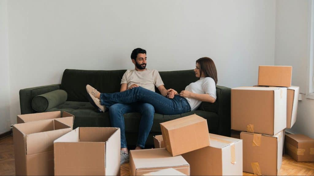 A man and woman at the sofa