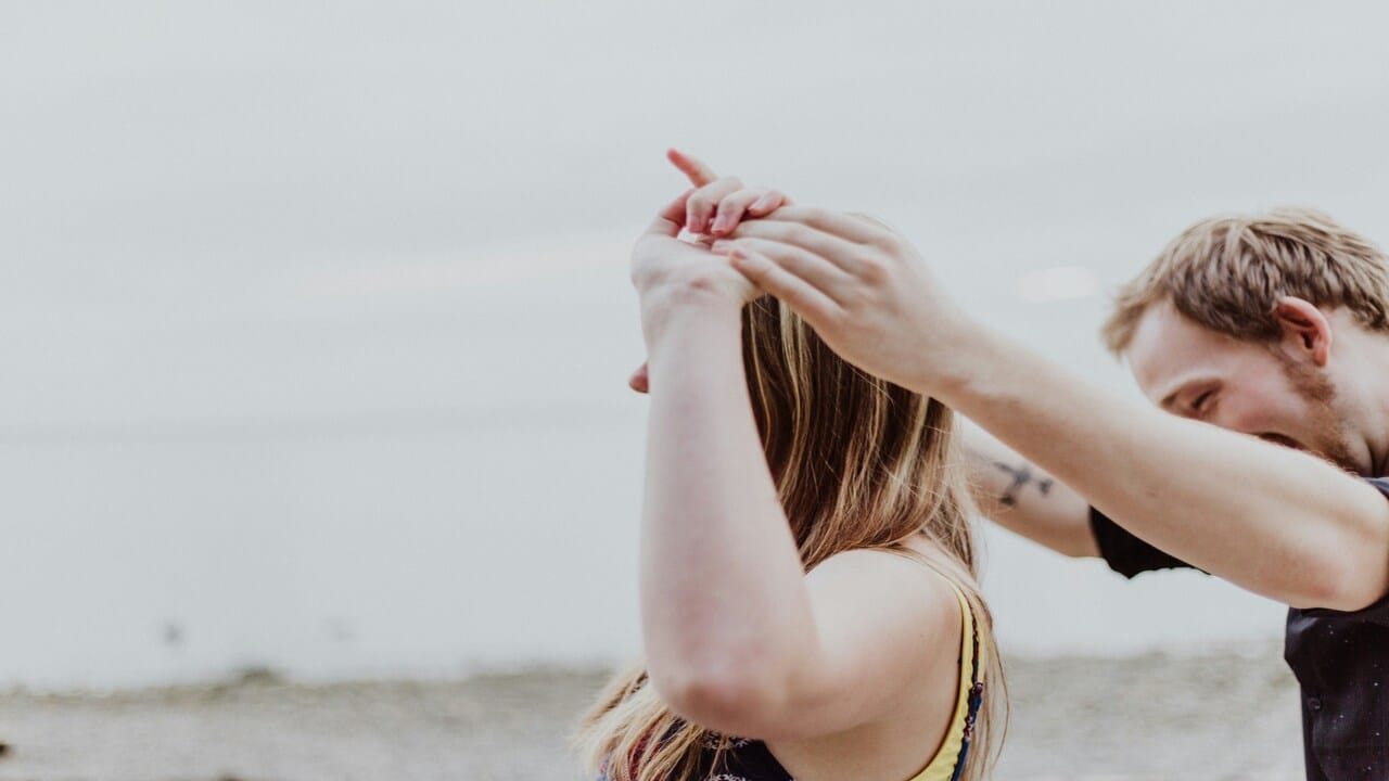 A couple walking on the beach