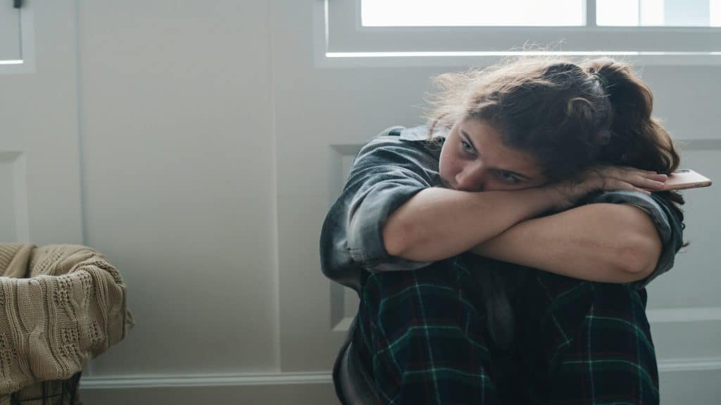 person feeling emotionally drained