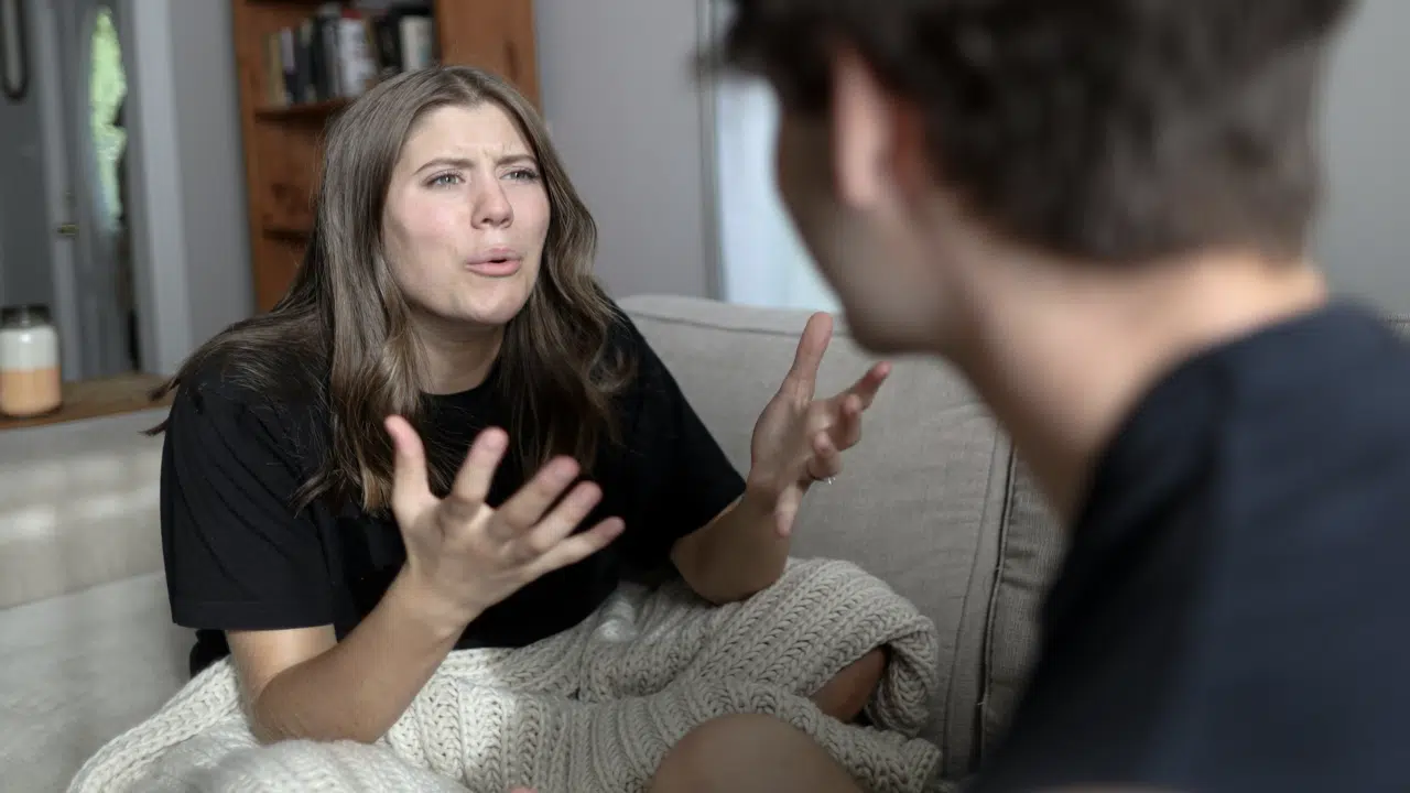 A woman yelling at her boyfriend