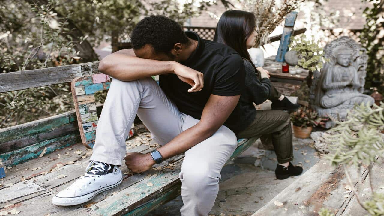 A couple refusing to look at each other