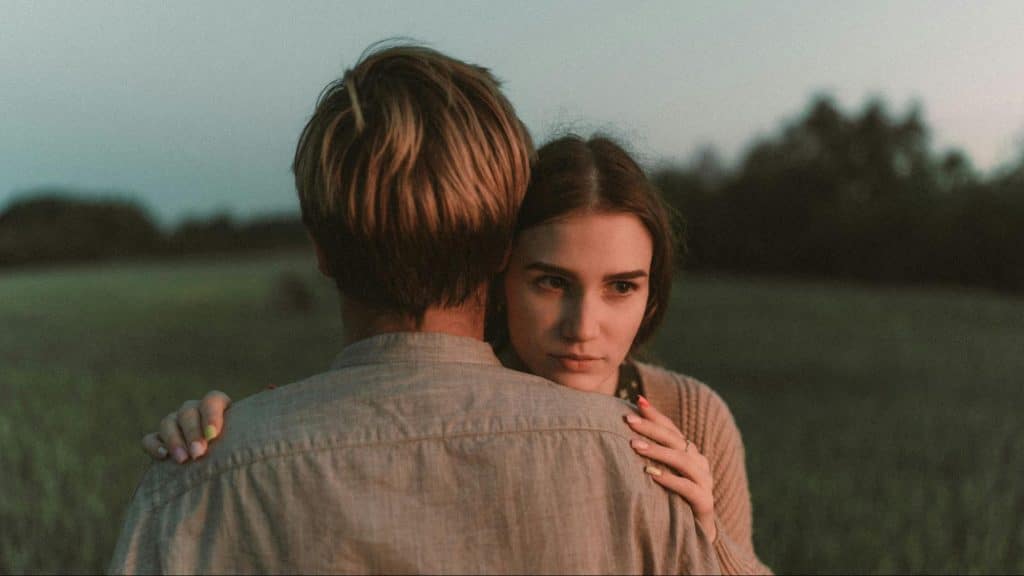 Woman hugging a man