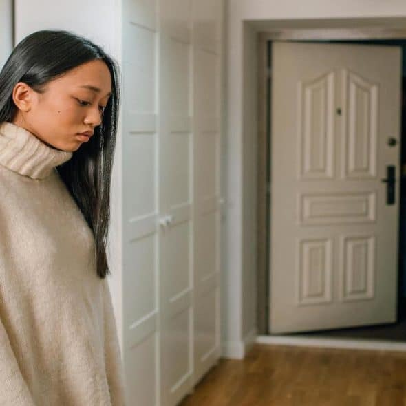 A woman left alone at home