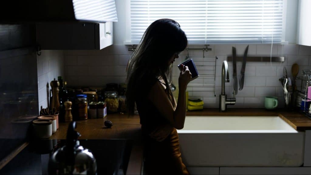 Woman alone in the kitchen