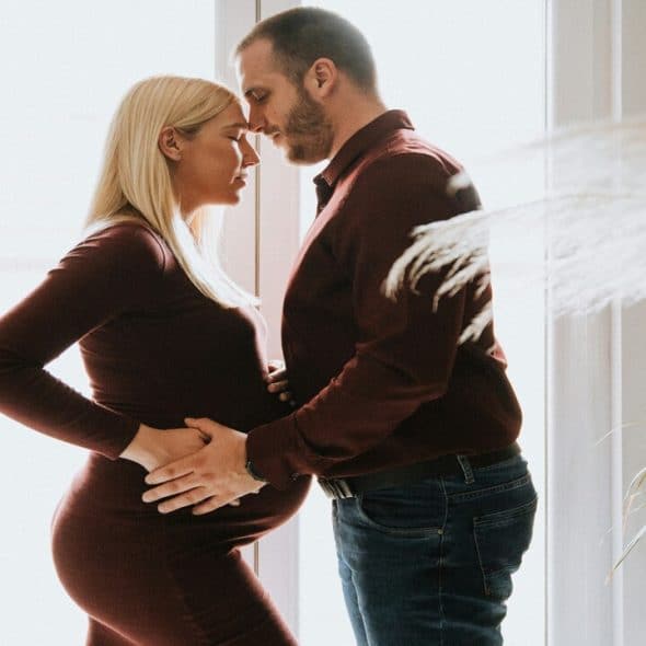 A man hugging his wife