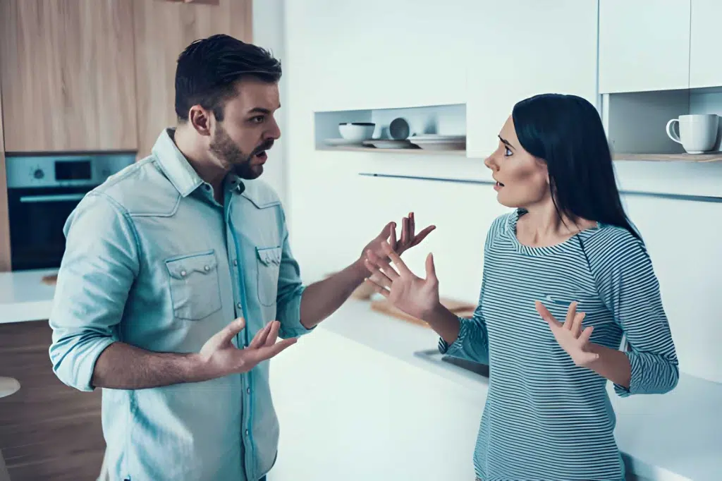 Couple having a disagreement in the kitchen