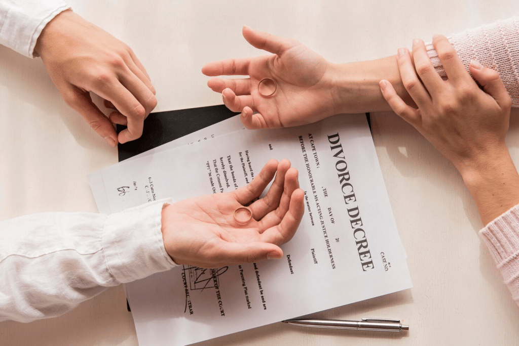 A man and woman signing papers