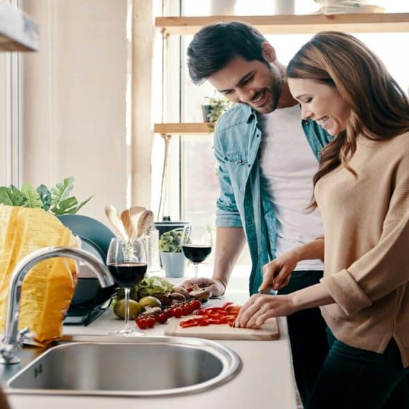 A couple cooking together