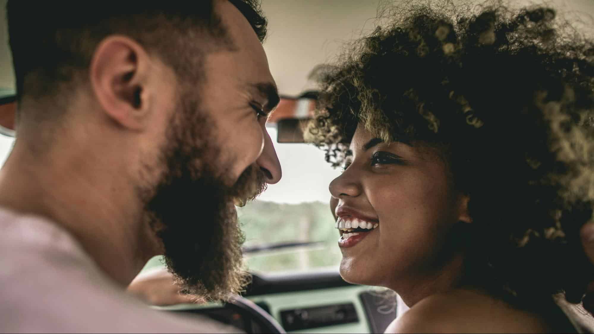 A man and woman looking at each other