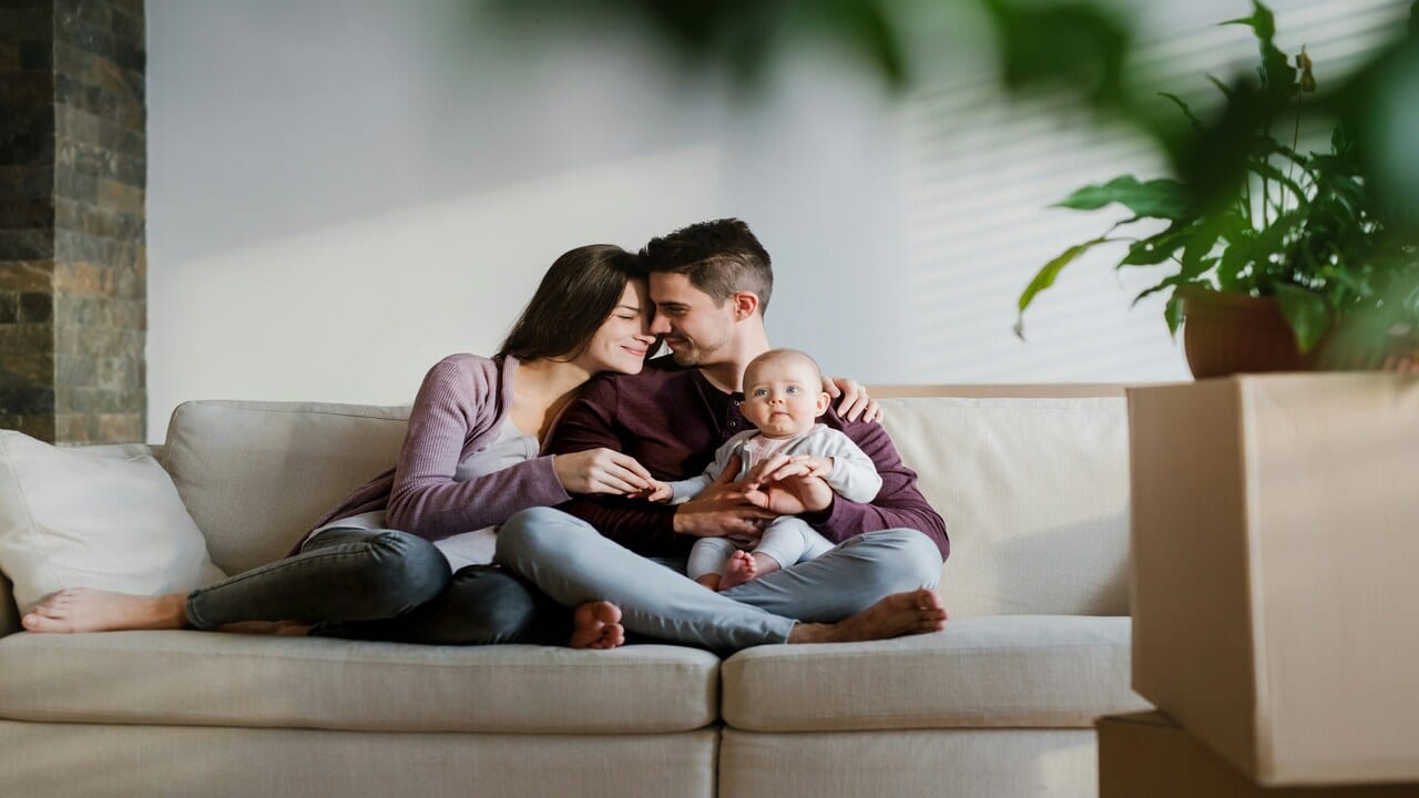 A couple spending time with their baby