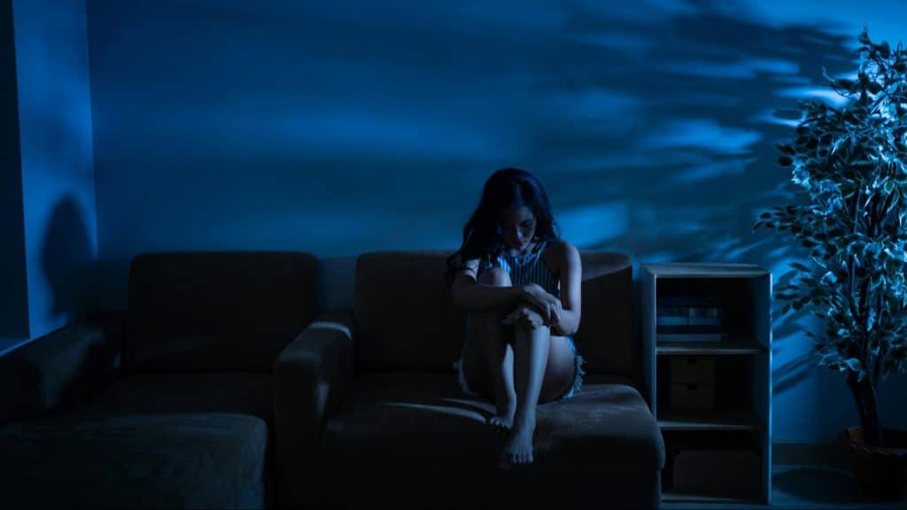 Woman in the dark alone