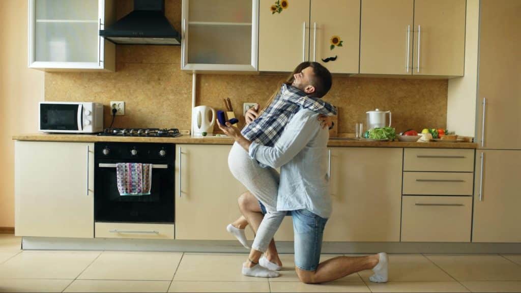 Woman hugging a man