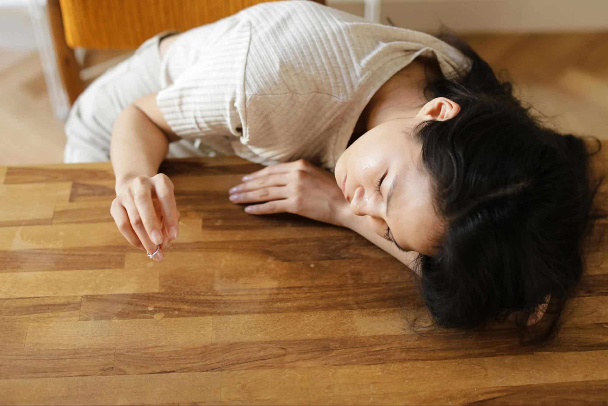 A woman lying down on a table.