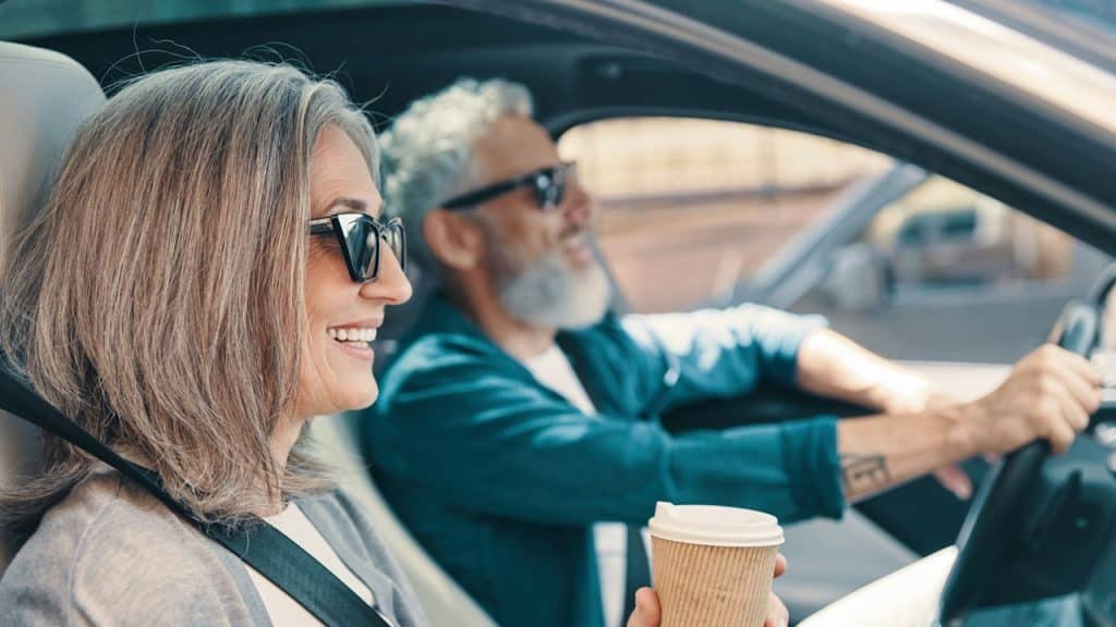 A mature couple in a car.