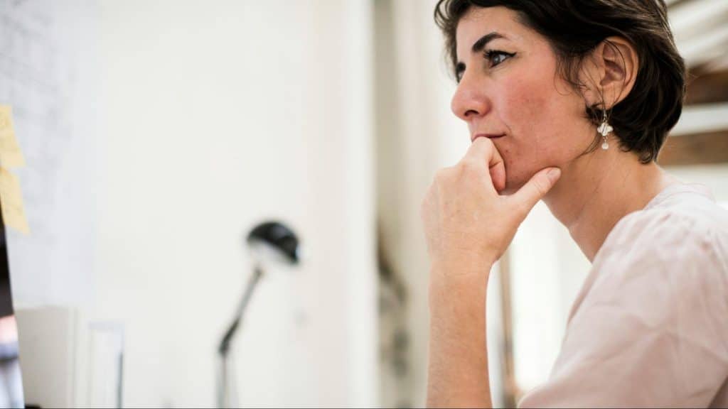 Woman thinking and being silent