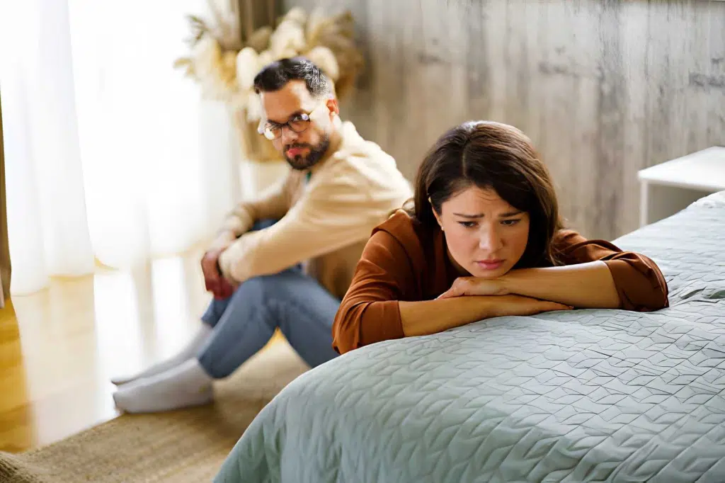 Upset woman feeling ignored by her partner