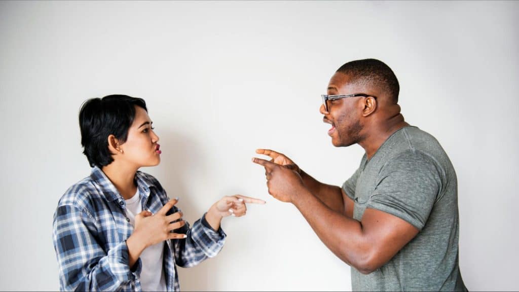 A man and woman arguing