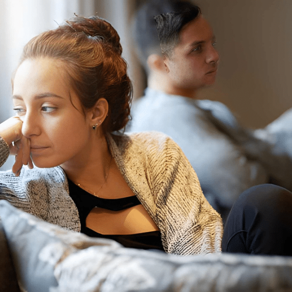 Woman looking despondent after a fight with her boyfriend
