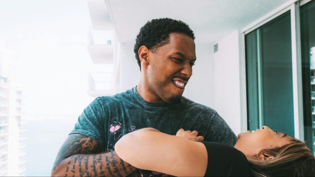 A man and woman being playful to each other