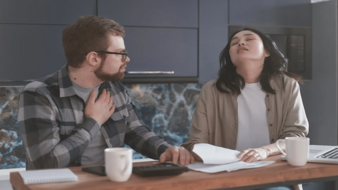 A couple talking about the bills