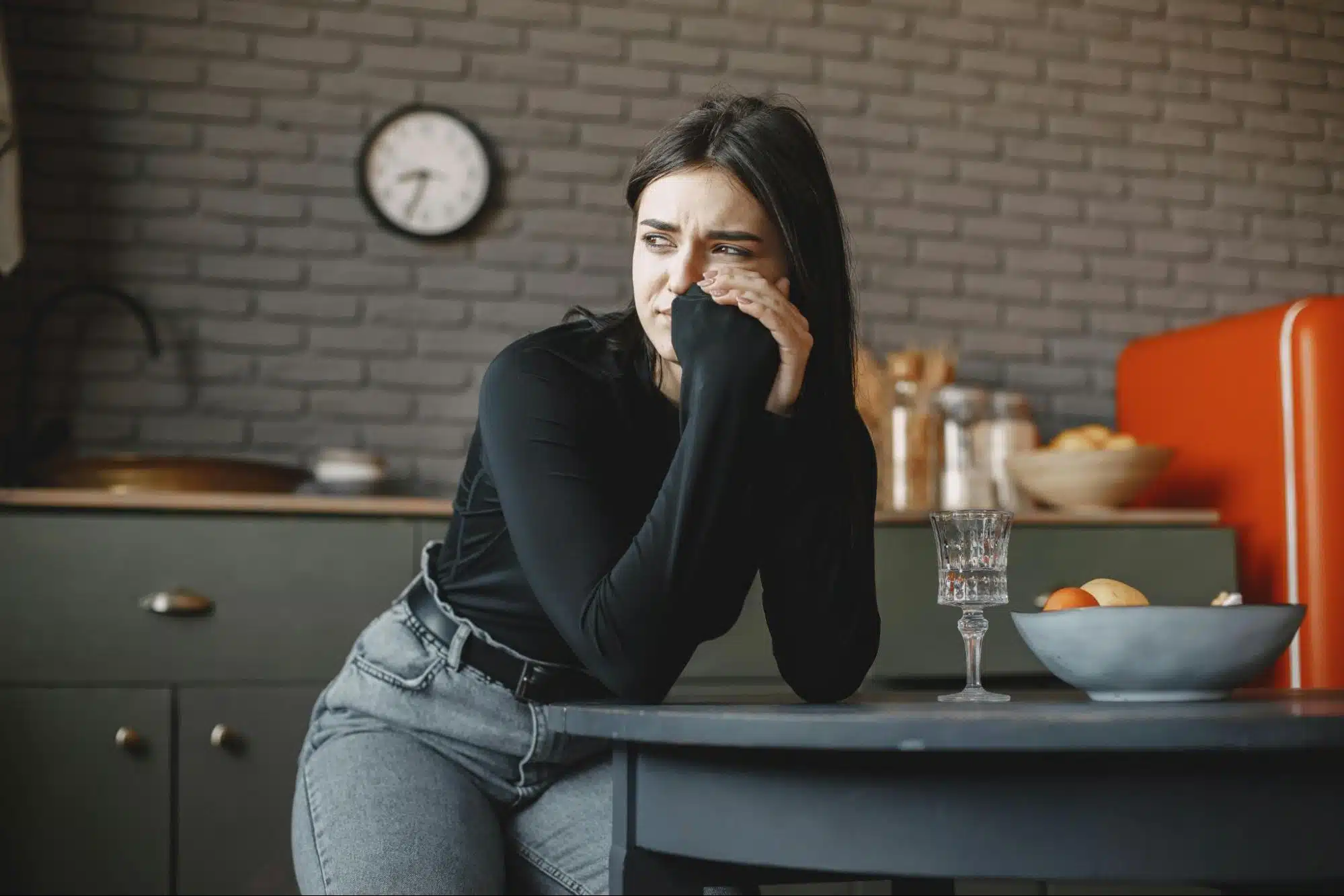 A woman crying.
