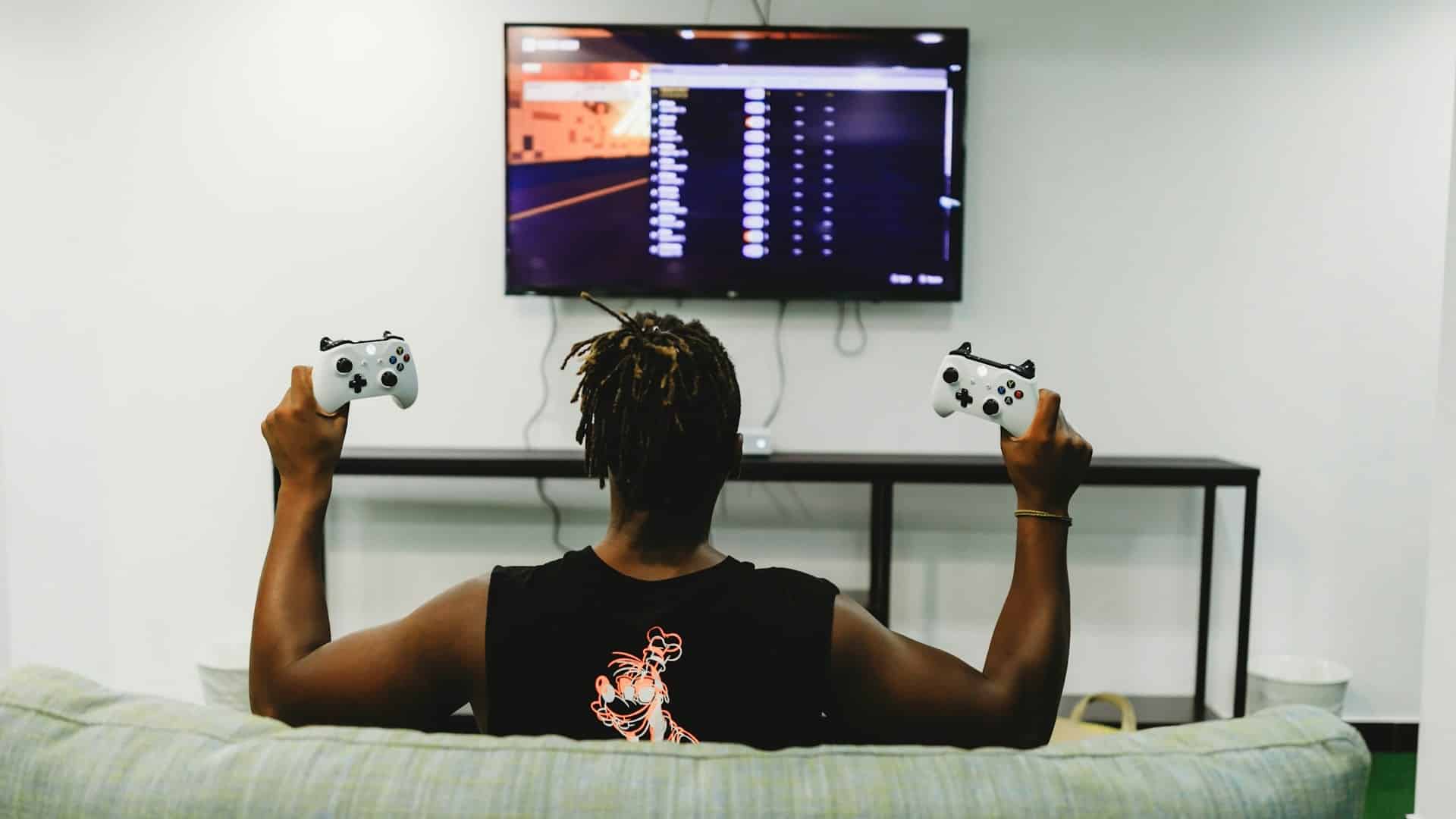 A man holding controllers.