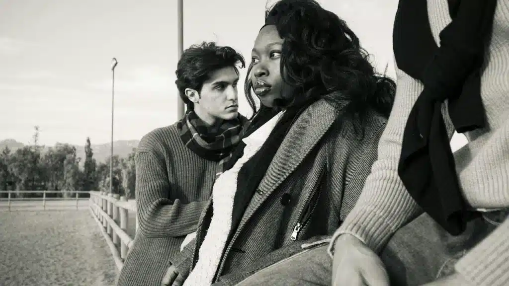 A man and a woman looking away from each other.