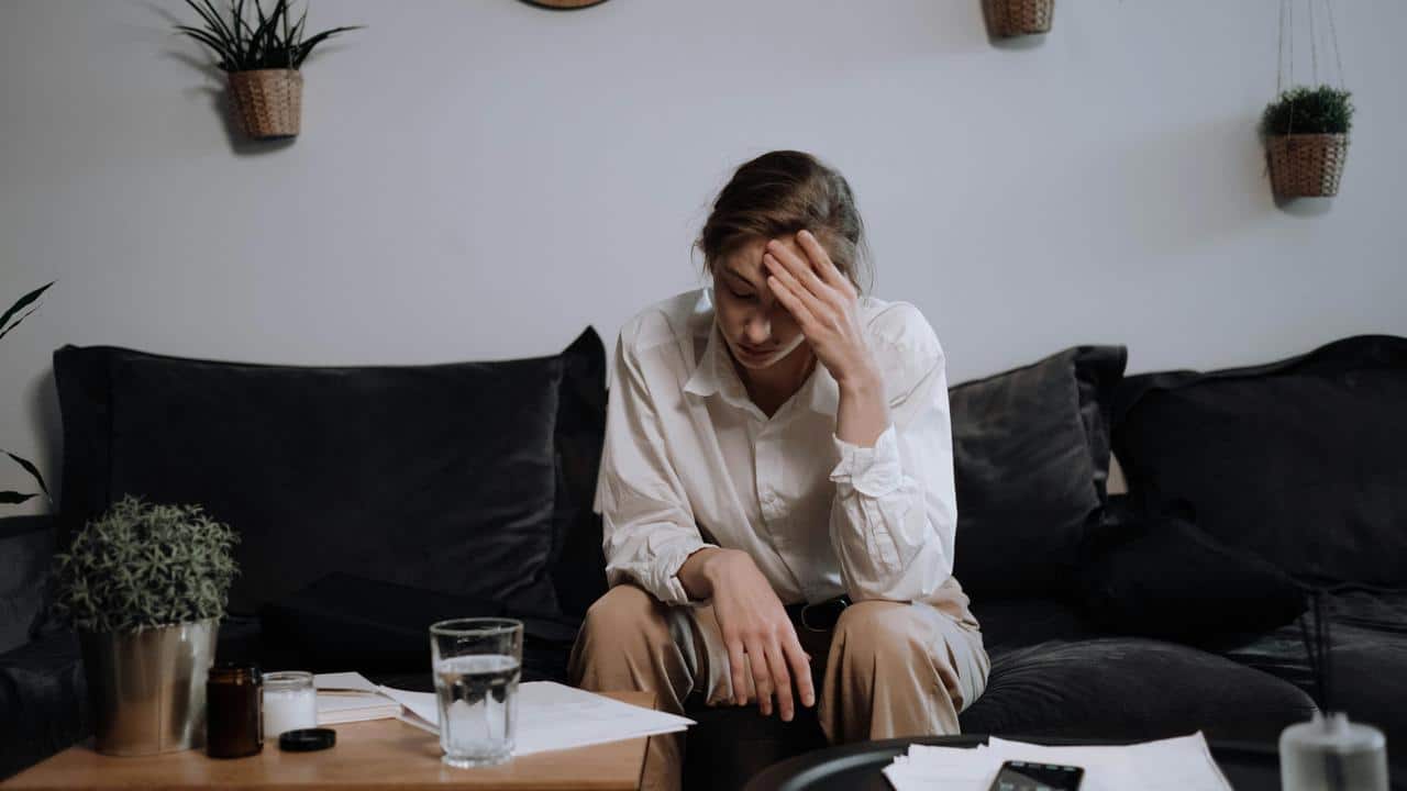 A woman sitting on a couch