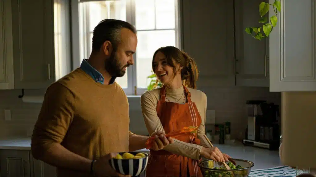 A man helping a woman