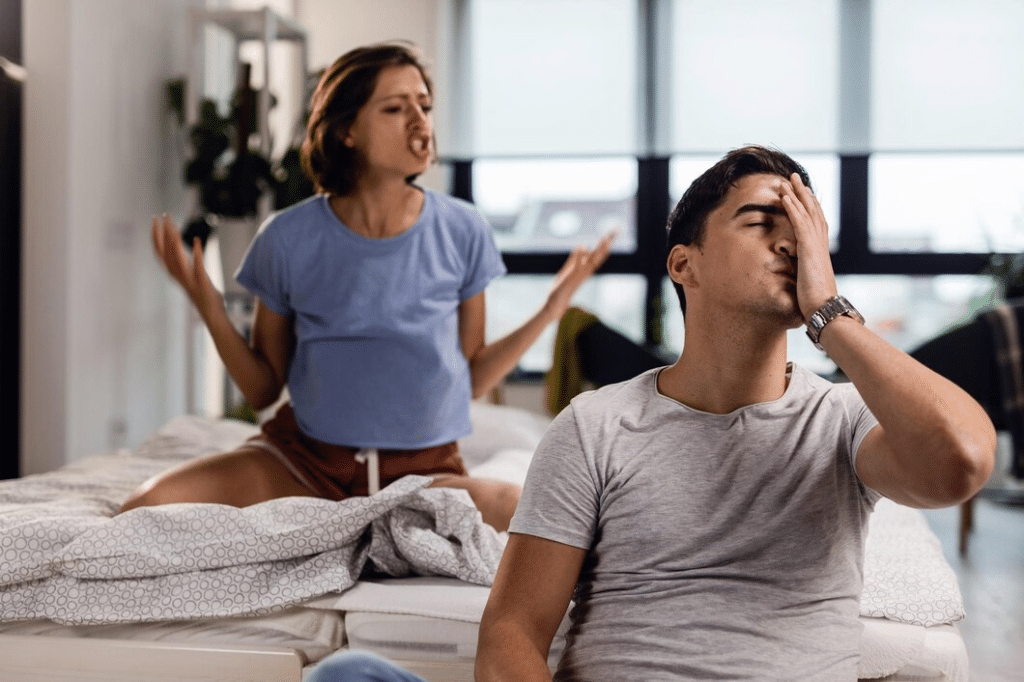 Couple yelling and expressing frustration at each other