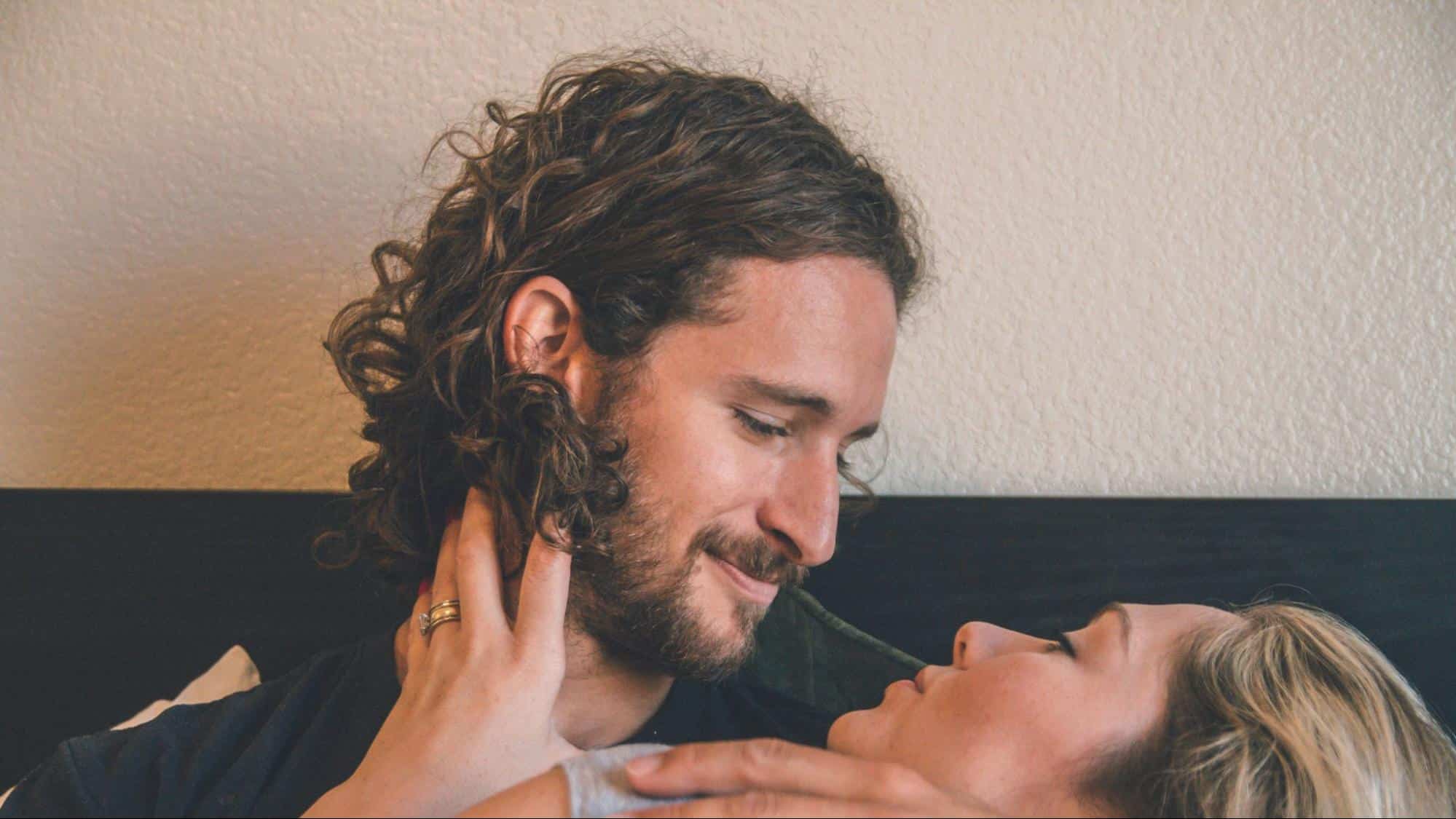 A man looking at the woman