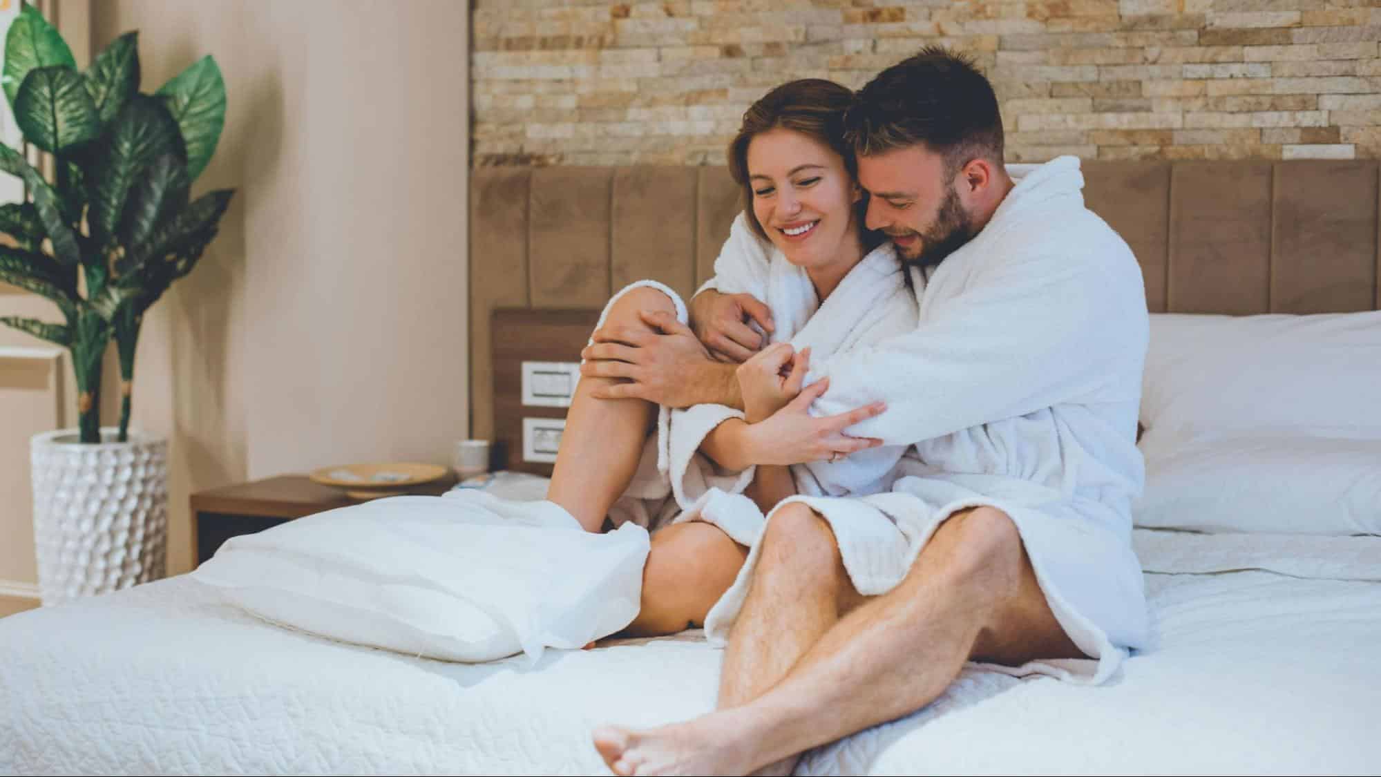 A man hugging a woman