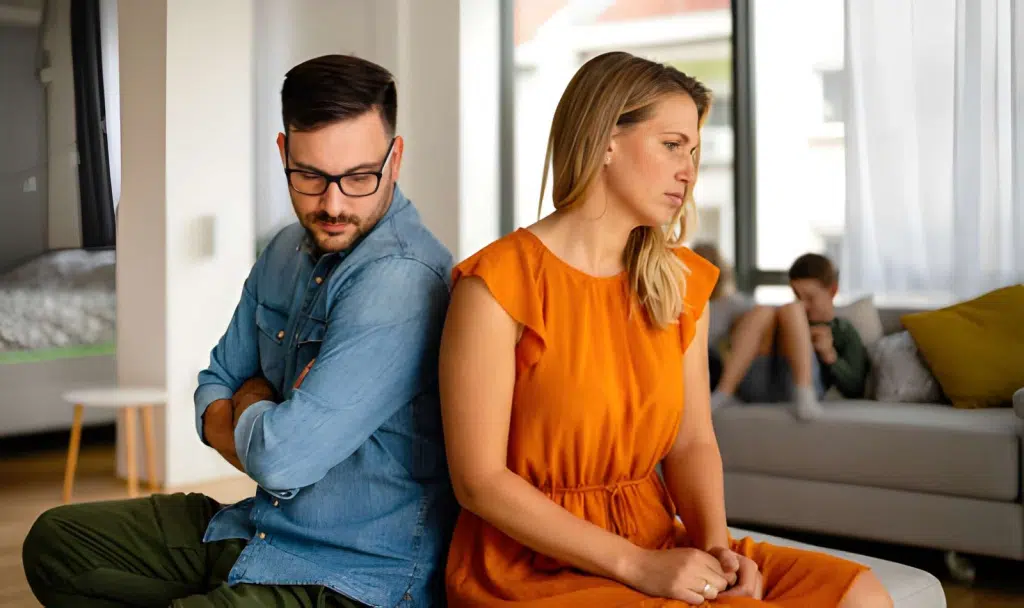 Unhappy couple having argument at home