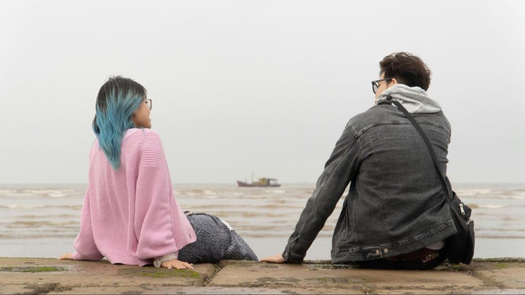 A man and woman talking
