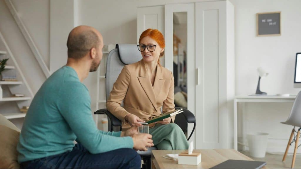 A man and woman talking