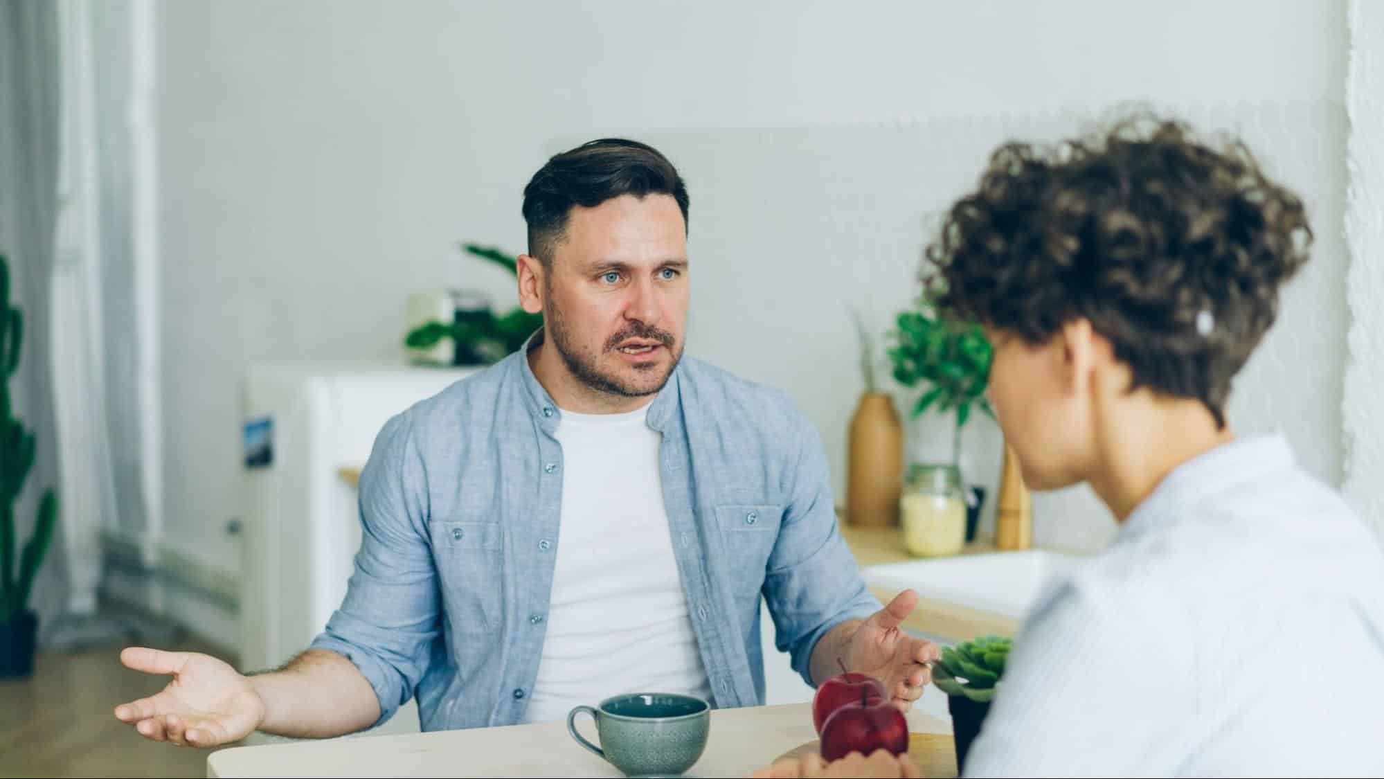 A man talking to woman