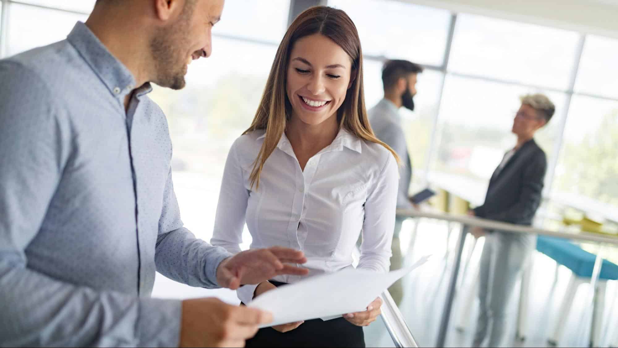 A man including woman in a plan