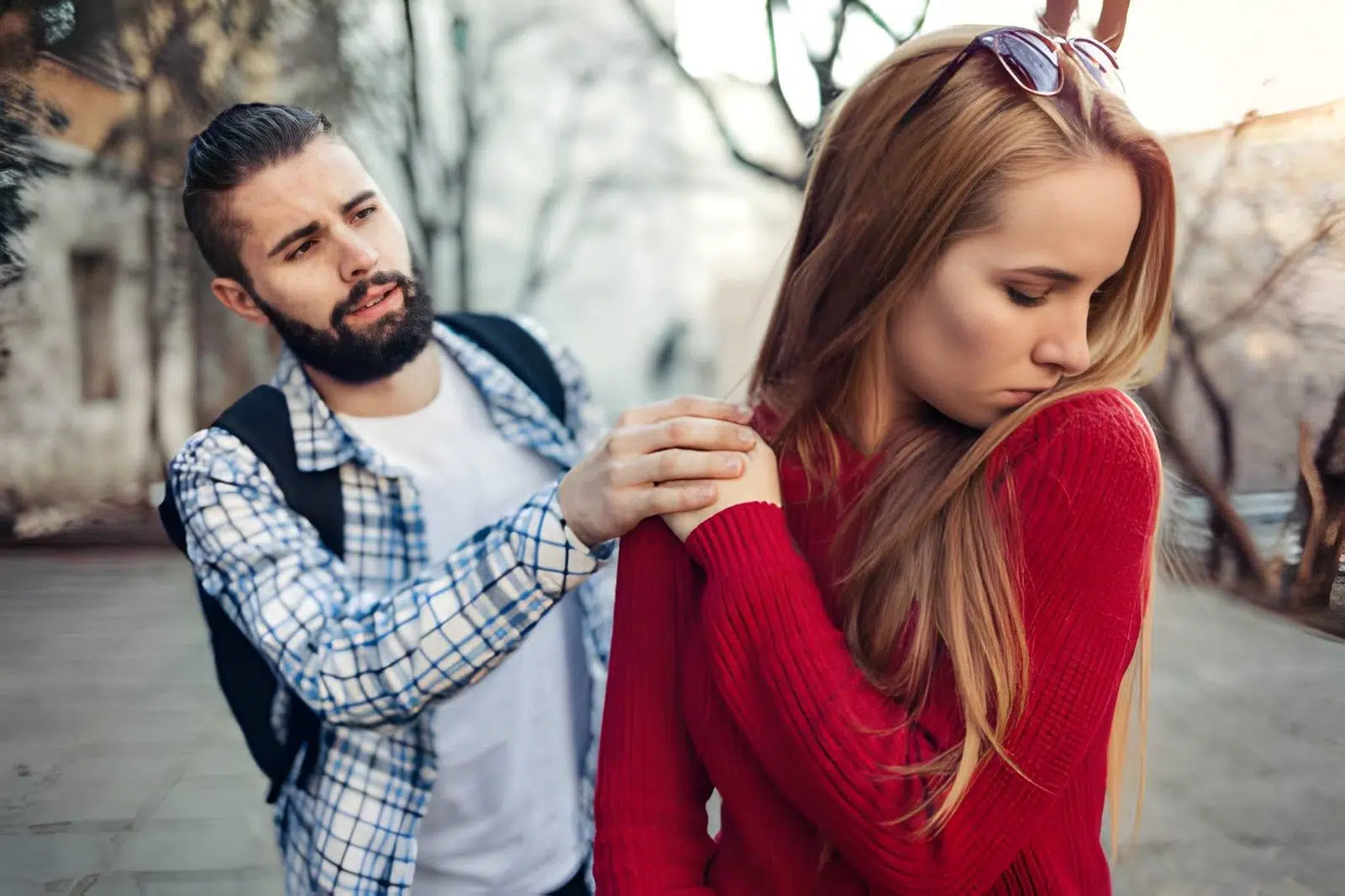 Girl turning away her head offended from a boyfriend