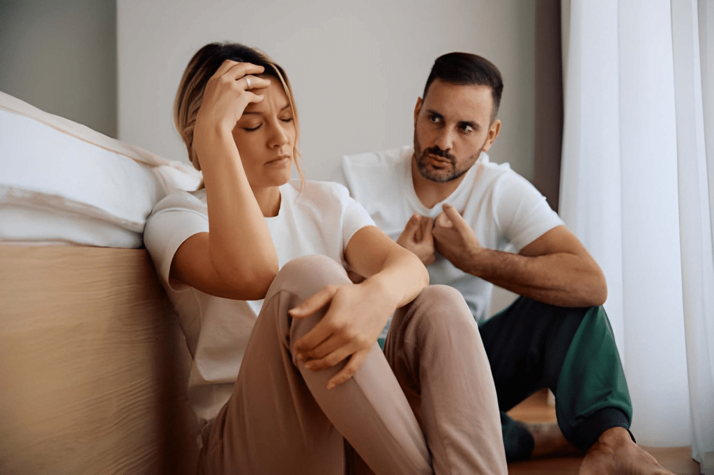 Woman and her husband feeling upset during an argument