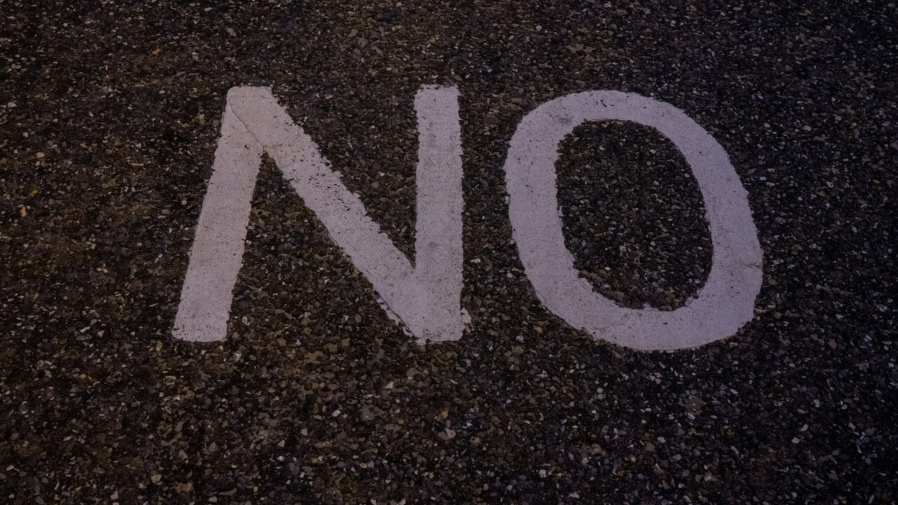 The word “no” painted on the ground