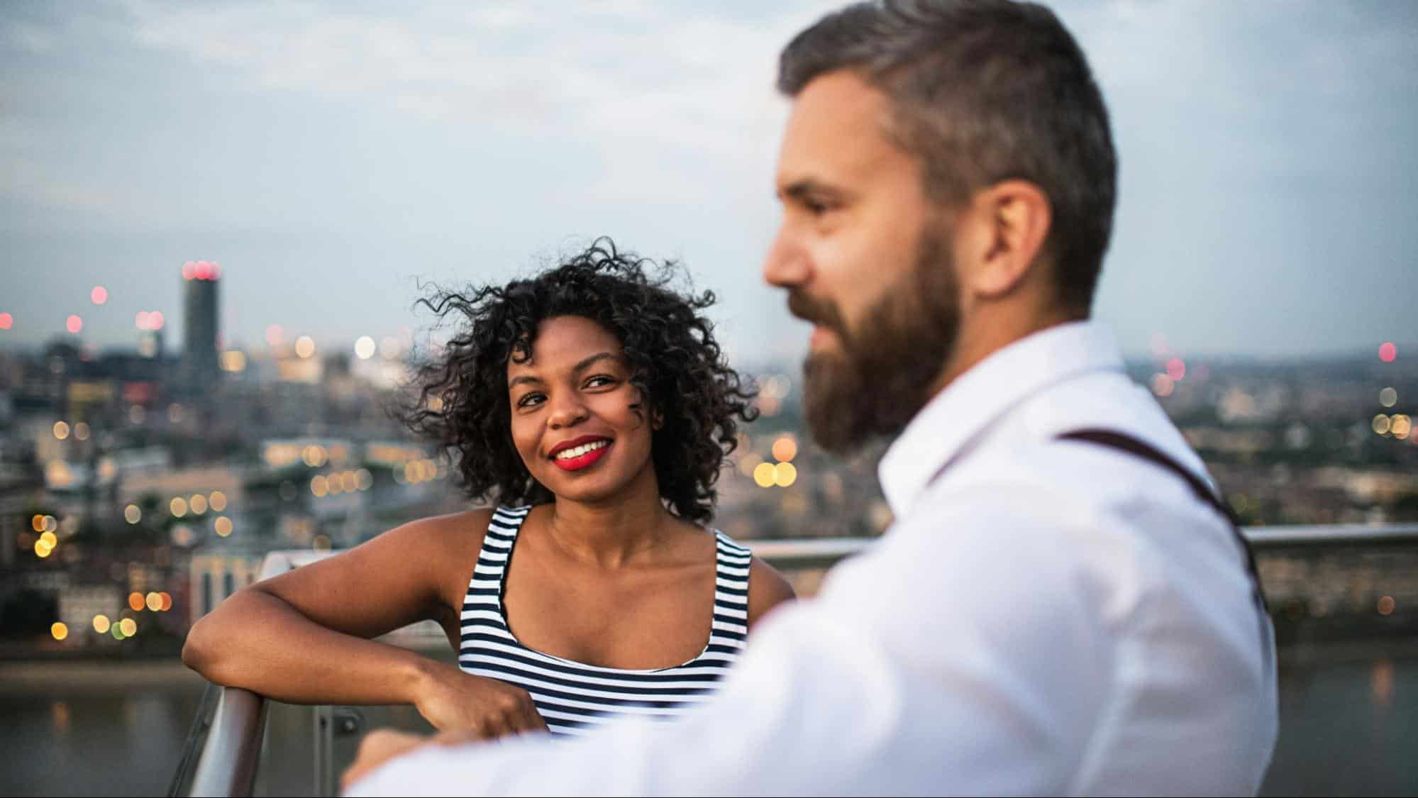 Woman looking at the man