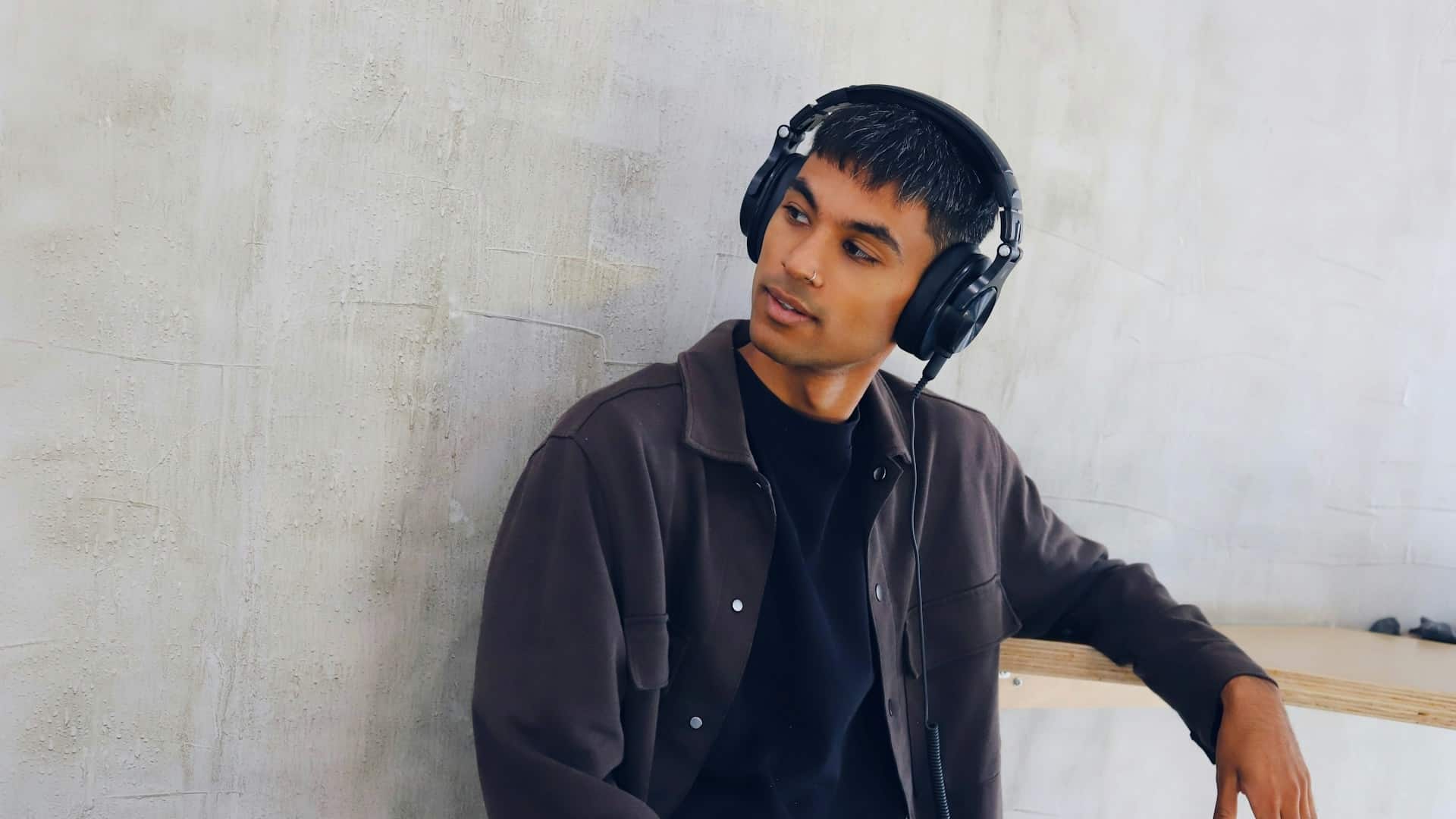 A man wearing headphones.