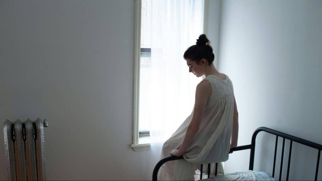Woman looking tired and thinking