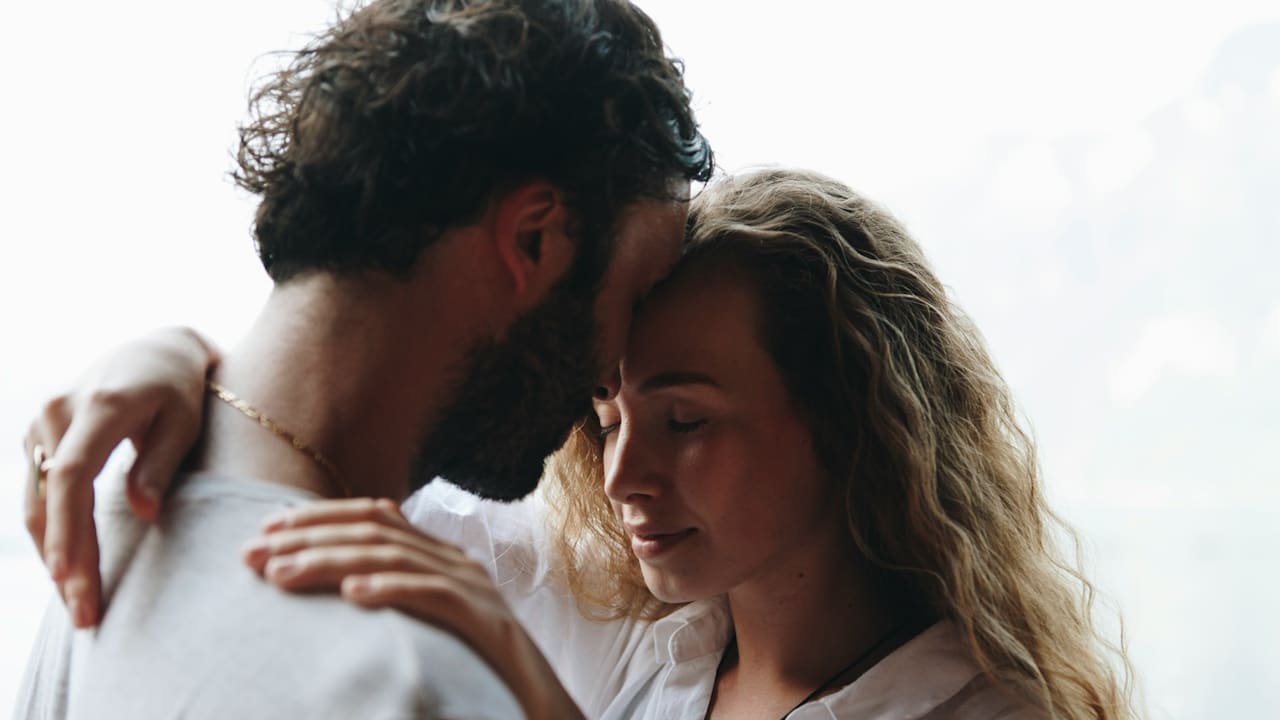A loving couple having a romantic moment.