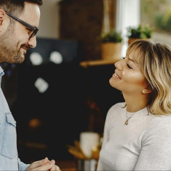A man and woman talking