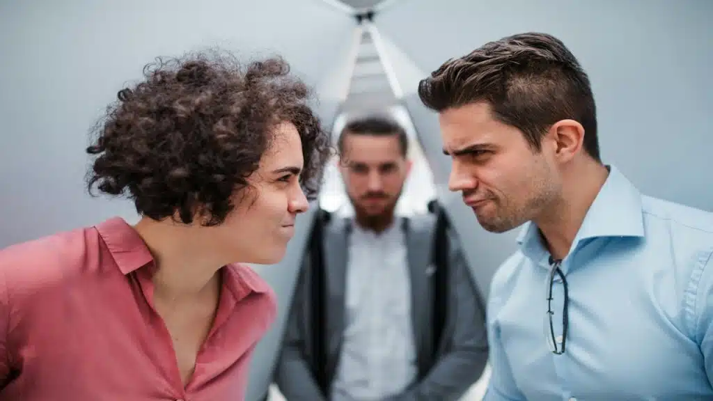 A man tries to interfere in a couple arguments.