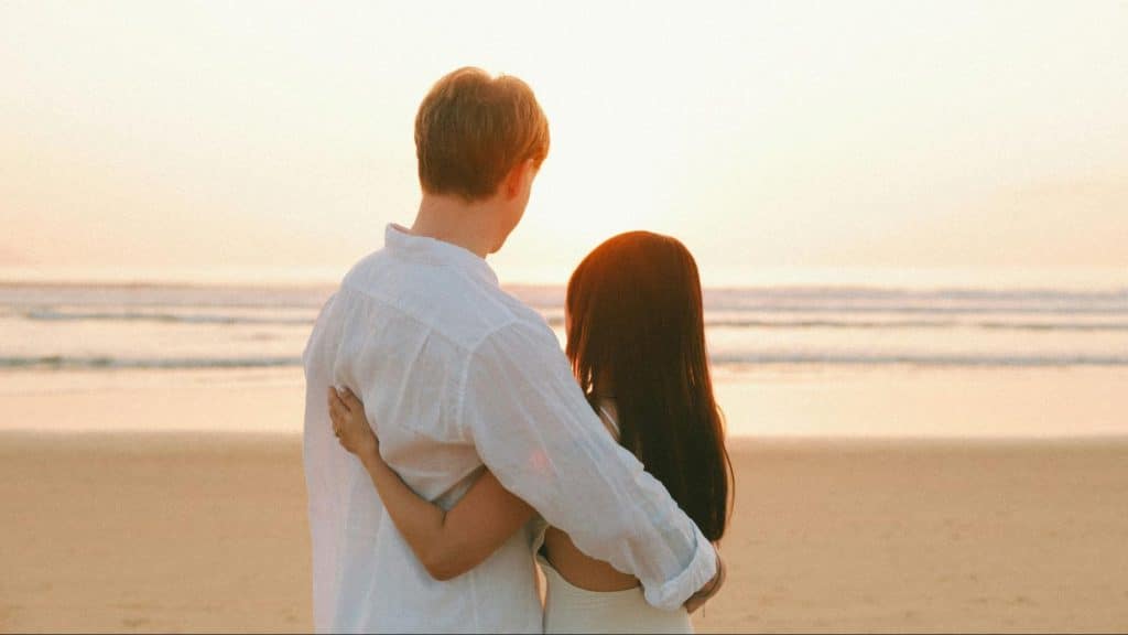 A couple watching the sunset together
